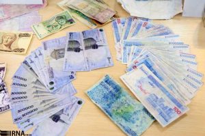 چگونه پول تقلبی را از اصل تشخیص دهیم؟