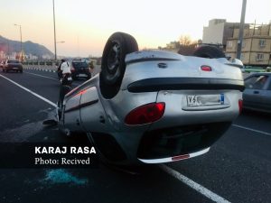 واژگونی خودروی پژو ۲۰۶ روی پل جانبازان + تصاویر
